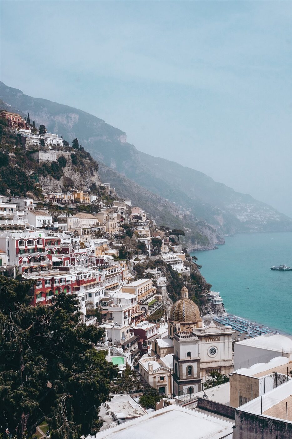 The houses of Positano stacked down the cliff to the sea