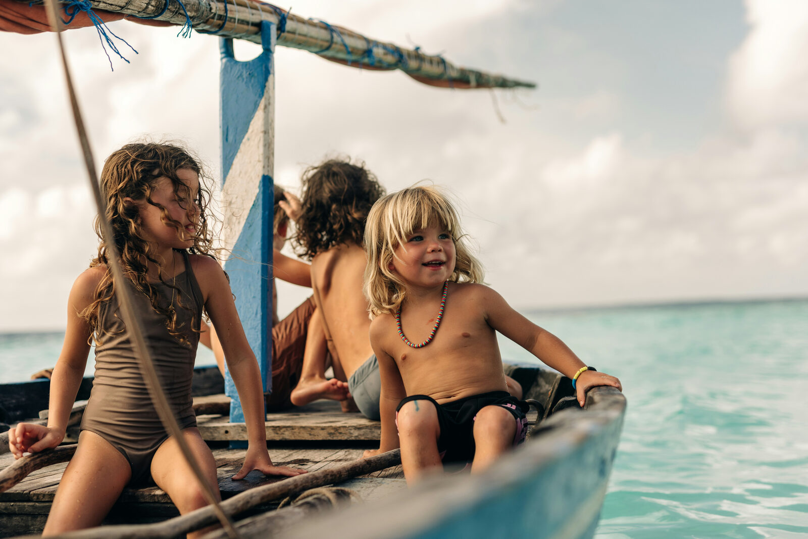 A family in the water on a bright day