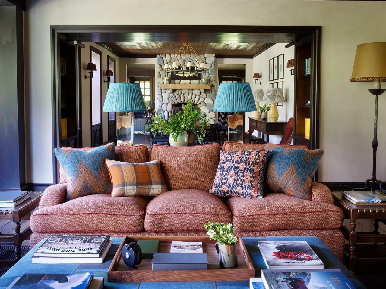 The lodge sitting room, with a fire and deep sofas