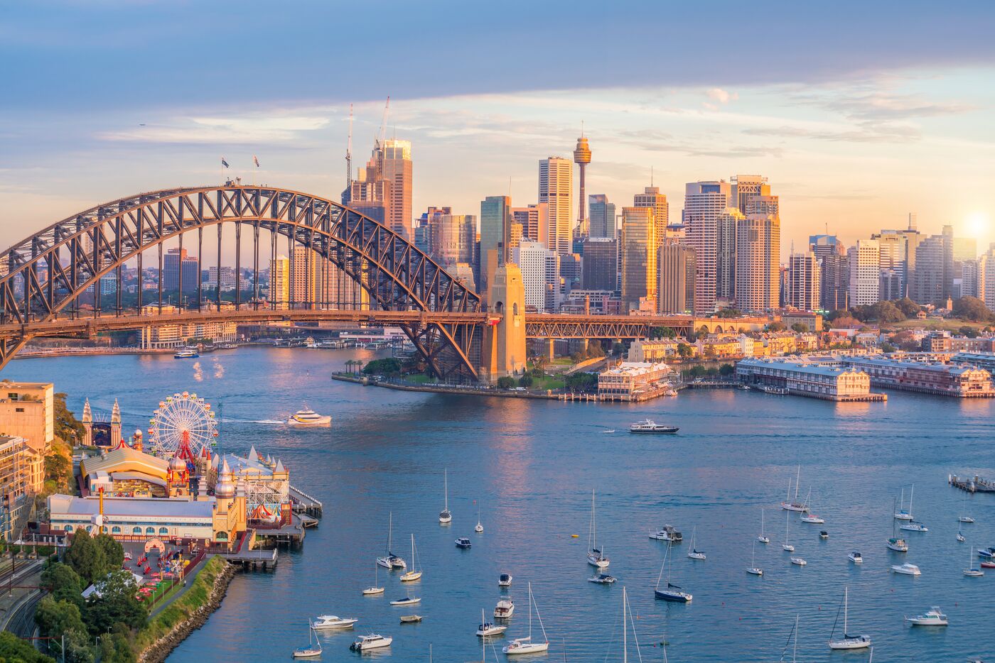 Sydney Harbour Bridge and the city skyline at dusk