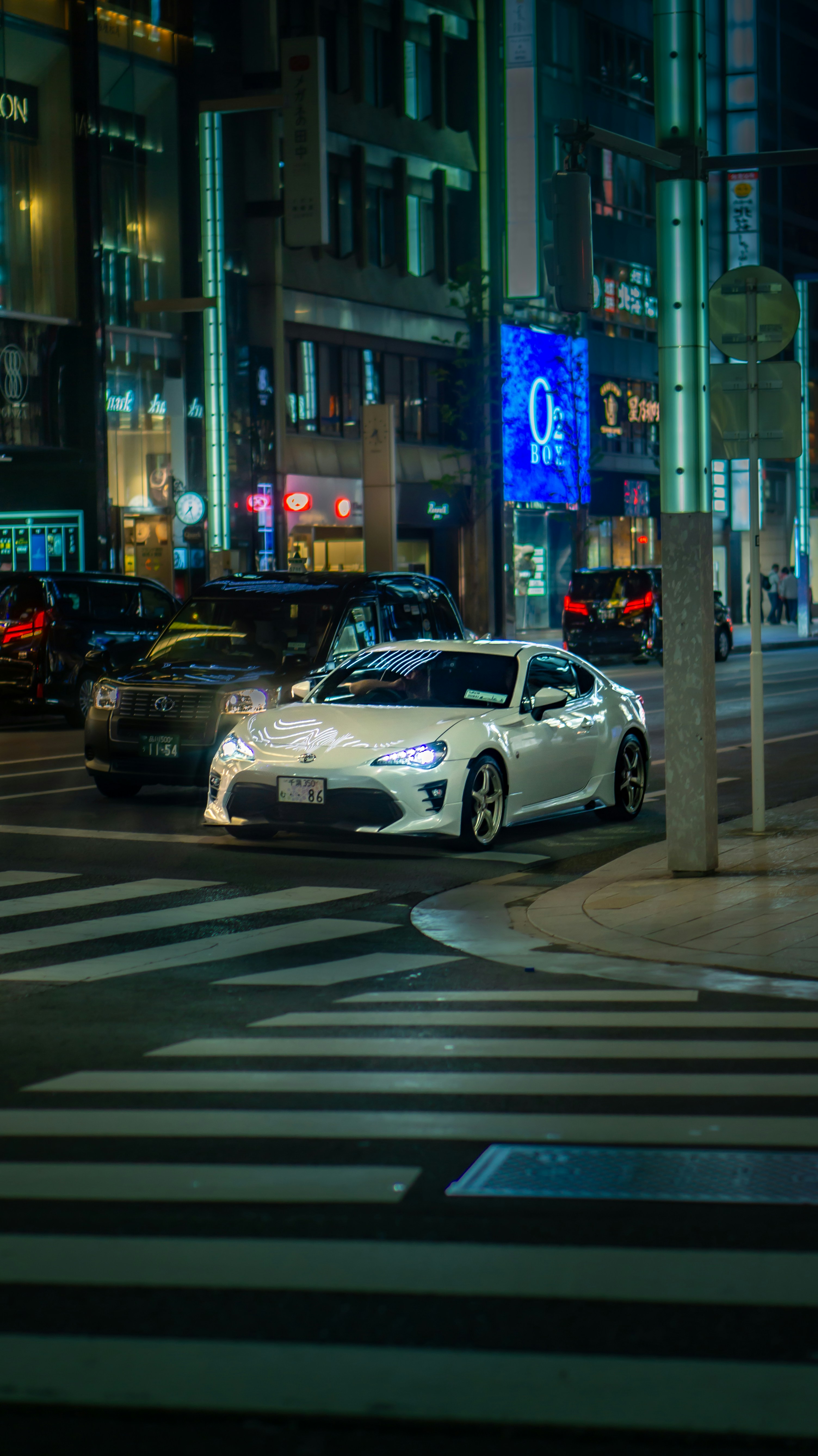 Car stopped at a streetlight in Japan